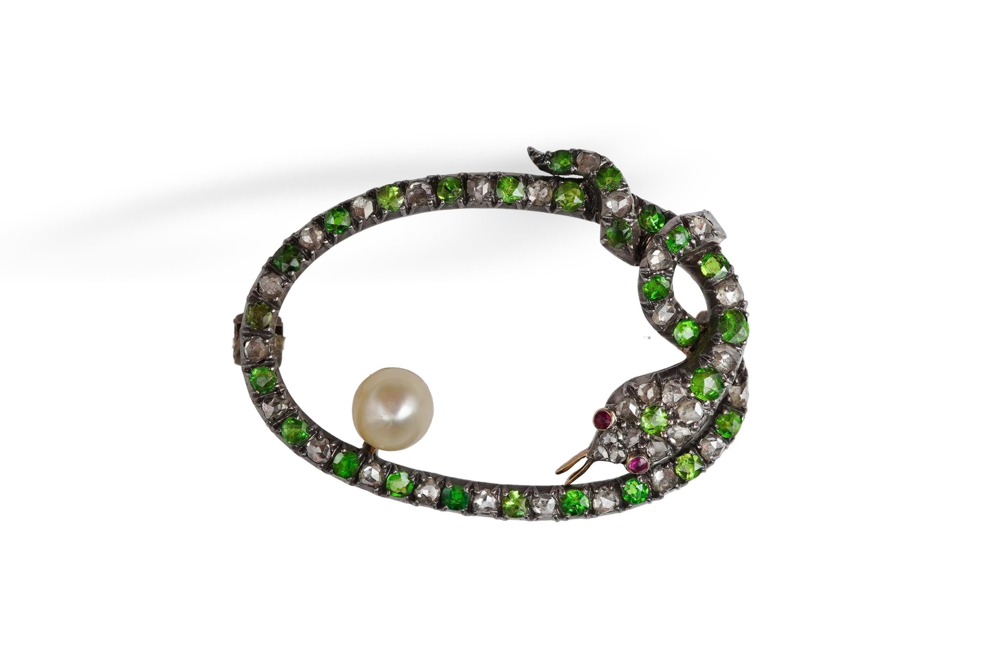 A Victorian demantoid garnet, pearl and diamond brooch, late 19th century